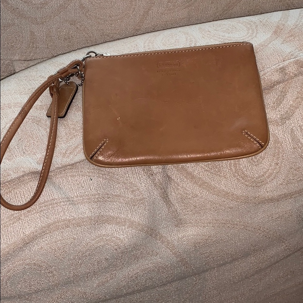 Camel/tan Coach Wristlet